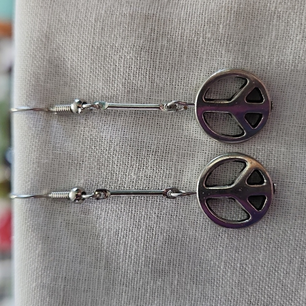 Peace Sign earrings pierced